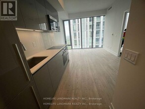 8-4908 Cumberland St in Toronto, ON - Building Photo - Building Photo
