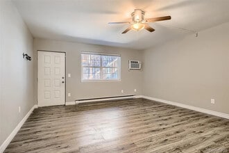 5873 S Prince St, Unit 103 in Littleton, CO - Building Photo - Building Photo