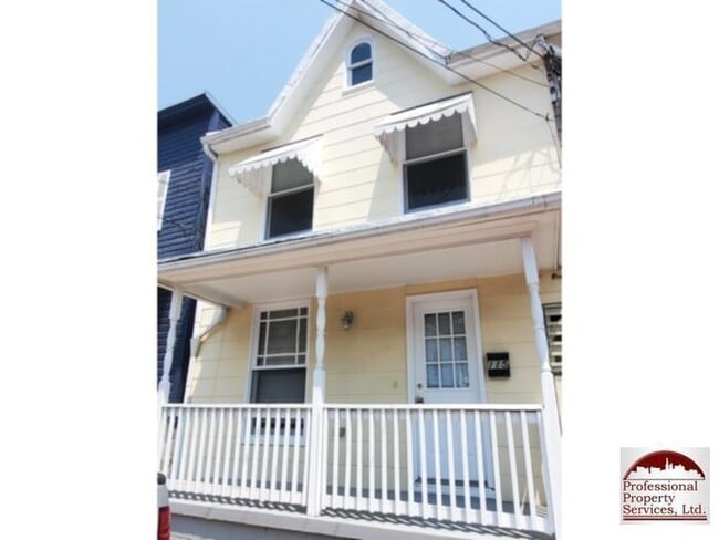 property at 115 E 6th St