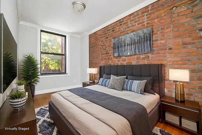 200 Stanton St, Unit 1A in New York, NY - Foto de edificio - Building Photo