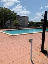 6960 Miami Gardens Dr-Unit -2-118 in Hialeah, FL - Building Photo - Building Photo
