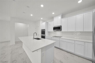 1145 NW 27th Ct in Cape Coral, FL - Building Photo - Building Photo