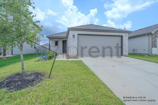 21734 Rustic River Ranch Ave in Prairie View, TX - Foto de edificio - Building Photo