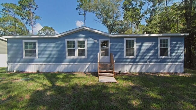 property at 11605 NW 20th St