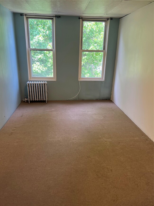 property at 70-15 Grand Ave