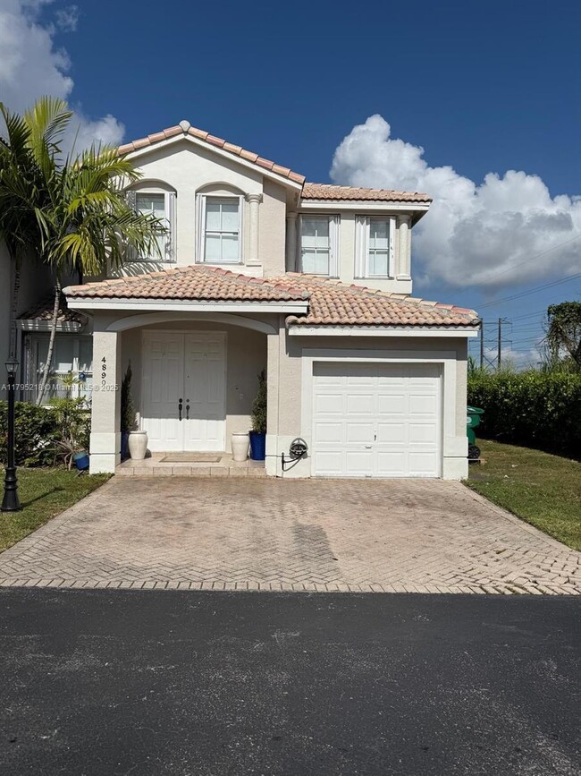 property at 4890 NW 108th Pl