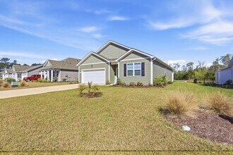 114 Brooks Dr in Little River, SC - Foto de edificio - Building Photo