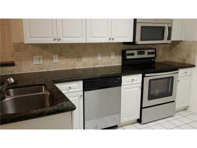 property at 9610 NW 2nd St