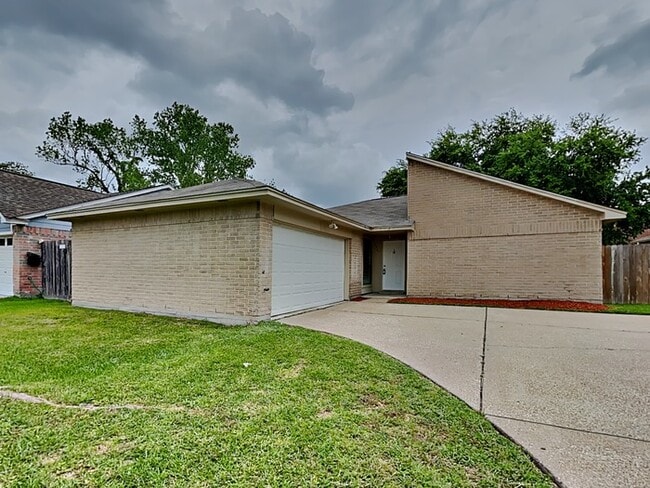 property at 5927 Woodmancote Dr