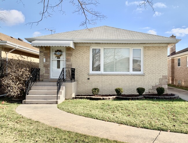 property at 4721 N Ozanam Ave