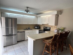 6447 SE Windsong Ln in Stuart, FL - Building Photo - Building Photo