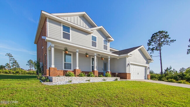 310 Confidence Wy in Southport, FL - Building Photo - Building Photo