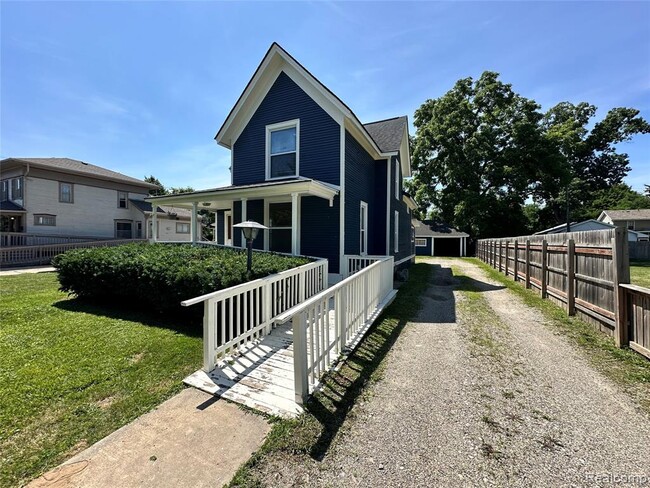 property at 715 E Grand River Ave