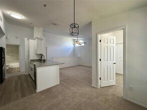1606 Columbia Arms Cir, Unit 224 in Kissimmee, FL - Building Photo - Building Photo