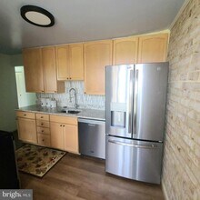 3319 Huntley Sq Dr in Temple Hills, MD - Building Photo - Building Photo