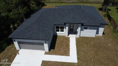 2862 Pomello Ave SW in Palm Bay, FL - Building Photo - Building Photo