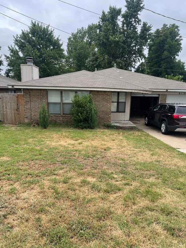 property at 6108 NW 16th St