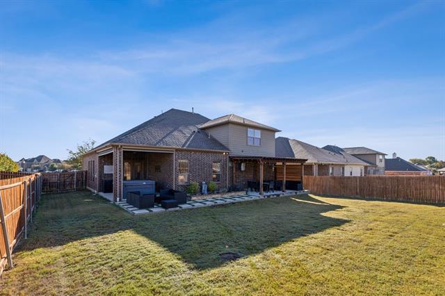 9316 Amistad Ln in Argyle, TX - Foto de edificio - Building Photo