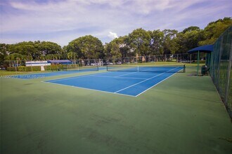 16100 Golf Club Rd in Weston, FL - Building Photo - Building Photo