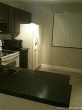 5761 Riverside Dr-Unit -101B4 in Coral Springs, FL - Building Photo - Building Photo