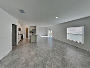 1338 Deepwater Cir, Unit 1000 Dumont A-103 in Eagle Lake, FL - Building Photo - Building Photo