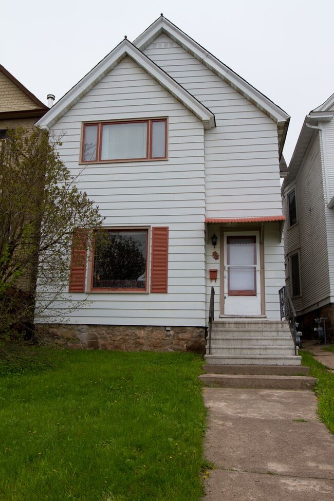 property at 1121 E 4th St