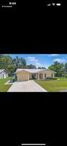 1119 Cr 457 in Lake Panasoffkee, FL - Building Photo