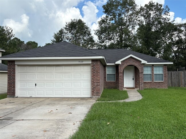 14129 Broken Arrow Dr in Willis, TX - Building Photo - Building Photo