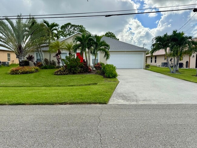 property at 5890 NW Dowse St