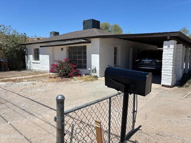 property at 114 E 12th St