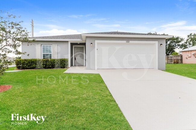 property at 122 SW Sea Lion Rd