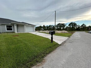 1110 Augusta St E in Lehigh Acres, FL - Building Photo - Building Photo