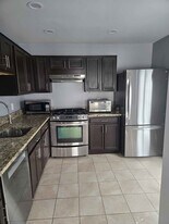 9240 Cardinal Forest Ln, Unit 302 in Lorton, VA - Building Photo