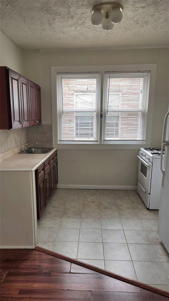property at 68-33 79th St