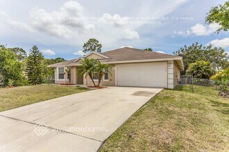 1566 SW Fresno Rd in Port St. Lucie, FL - Building Photo - Building Photo