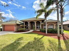 101 Jacaranda Ct in Royal Palm Beach, FL - Building Photo