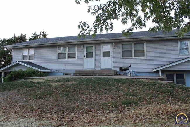 property at 302 W Neosho St