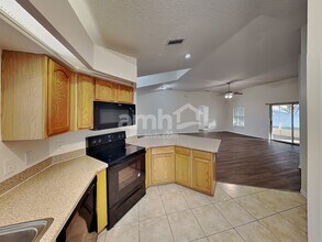 4611 Treasure Cay Rd in Tavares, FL - Building Photo - Building Photo