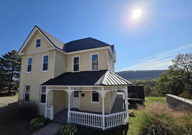 property at 77 E Houston Ave