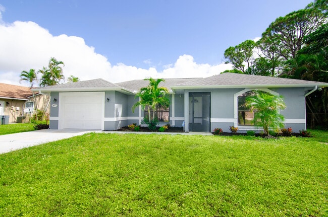 property at 1677 SE Trumpet Ln