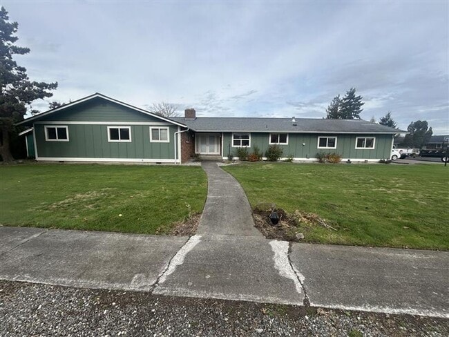 property at 209 E 3rd St