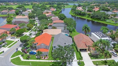 6017 Newport Village Way in Greenacres, FL - Building Photo - Building Photo