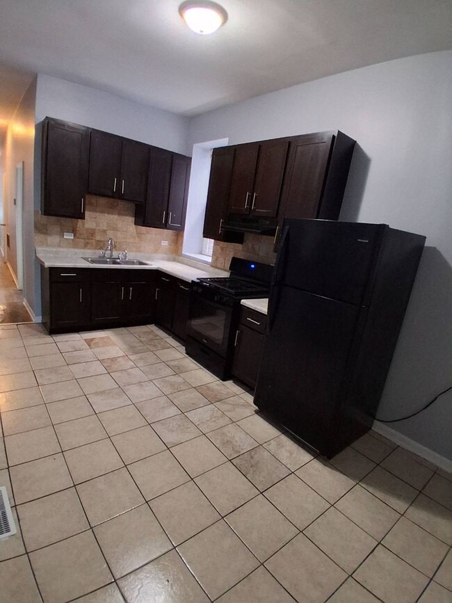 property at 7633 S Lowe Ave