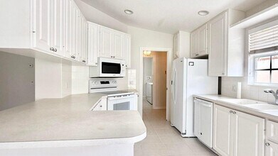 7701 Pine Island Way in West Palm Beach, FL - Building Photo - Building Photo