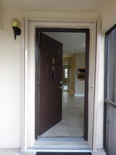 7091 Golf Colony Ct in Greenacres, FL - Building Photo - Building Photo