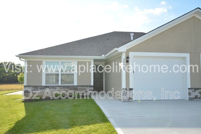property at 20927 E 8th St S