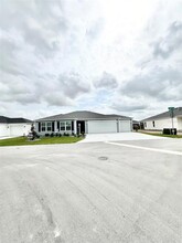 7571 BLACKTON Ave in Okahumpka, FL - Building Photo - Building Photo