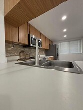 1005 Palm Beach Trace Dr, Unit 1005 in Royal Palm Beach, FL - Foto de edificio - Building Photo