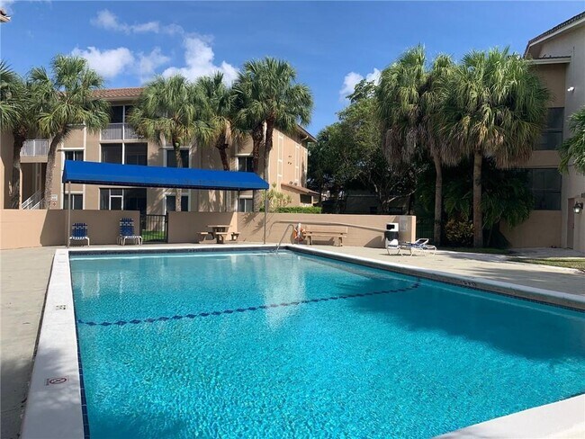 10001 W Atlantic Blvd in Coral Springs, FL - Building Photo - Building Photo