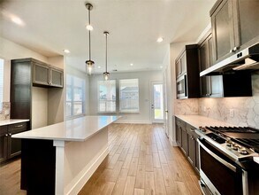 10638 Blossom River Dr in Sienna, TX - Building Photo - Building Photo